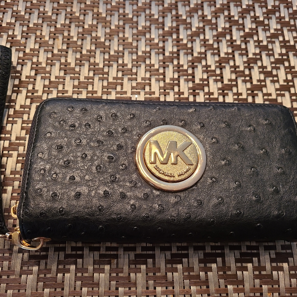 Michael Kors black wallet.